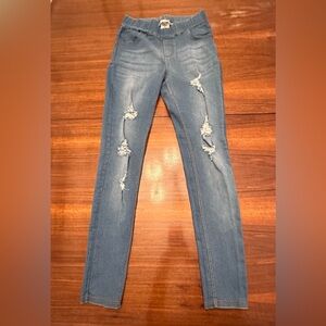 Ladies distressed denim jeggings, size small.